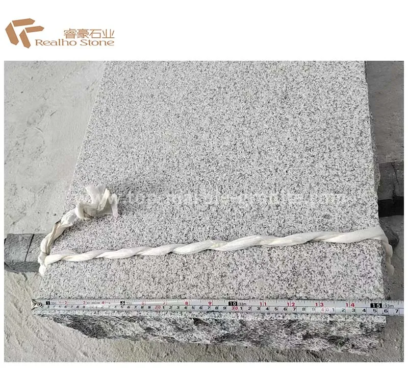 Granite paver with split edge